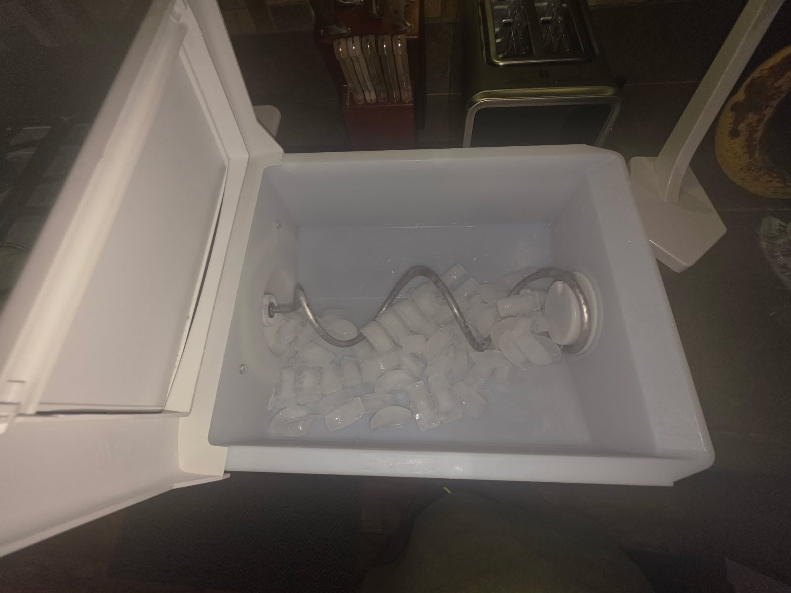 Kenmore refrigerator ice maker assembly showing installed components